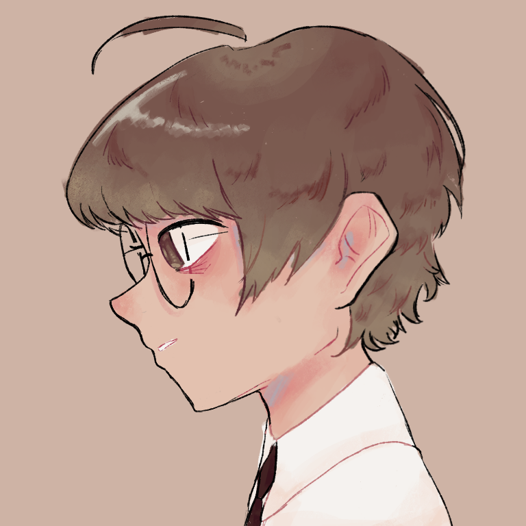 side profile of a boy with brown hair and round glasses