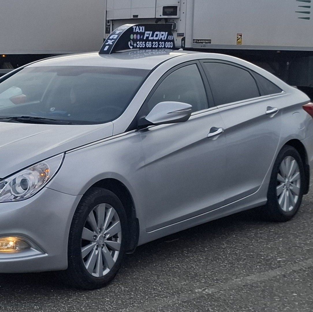Flori Taxi Front
