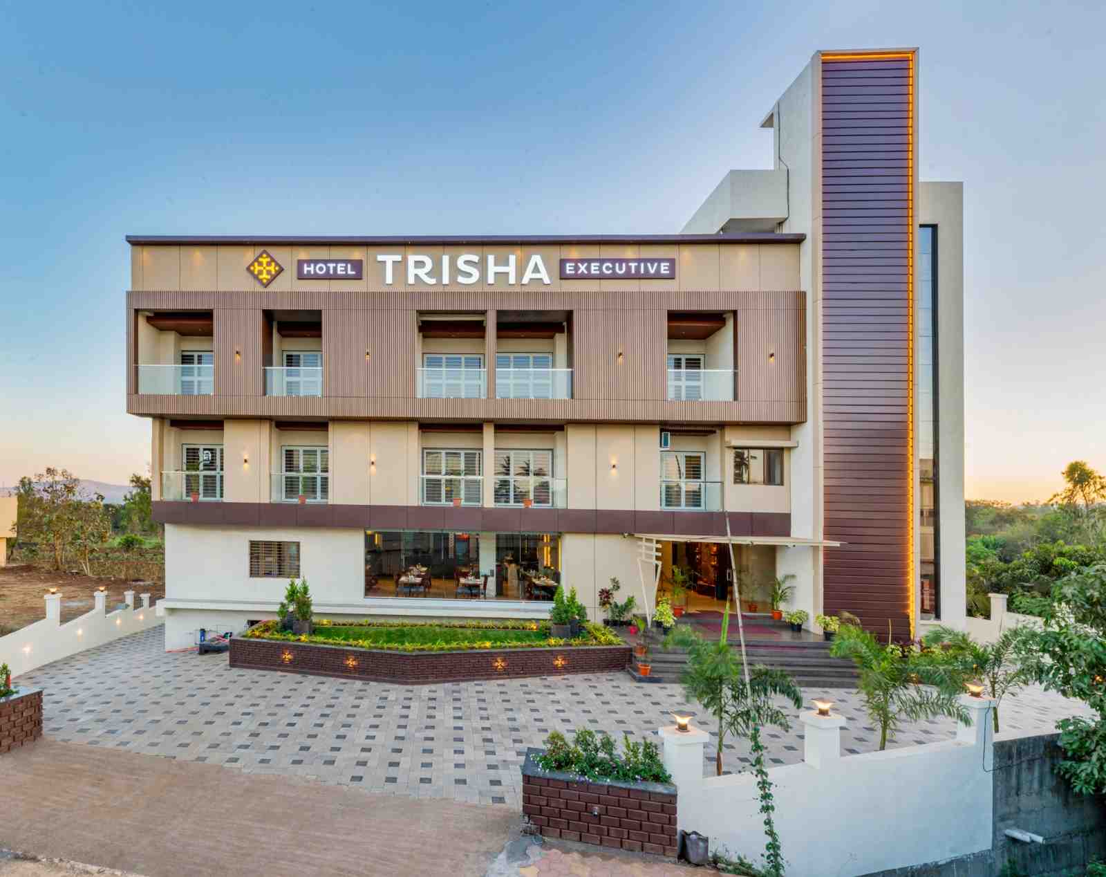 Actual exterior of Hotel Trisha Executive in Adamapur, Kolhapur, opposite Shri Sant Balumama Temple