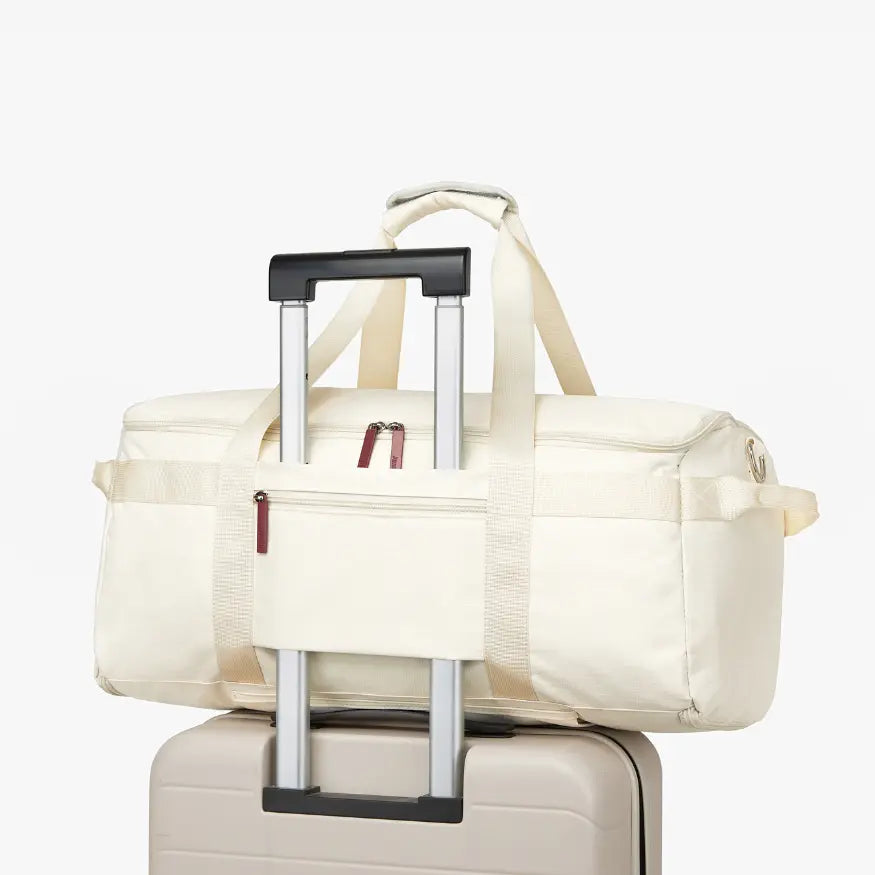 Bolso de viaje en compartimento superior de avión