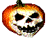 a gif of a pumpkin with a skull for a face