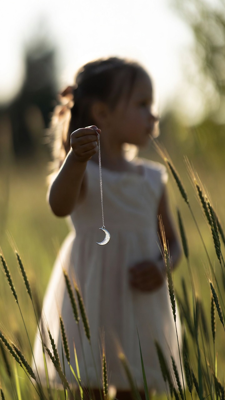 The Child and the Silver Moon Charm