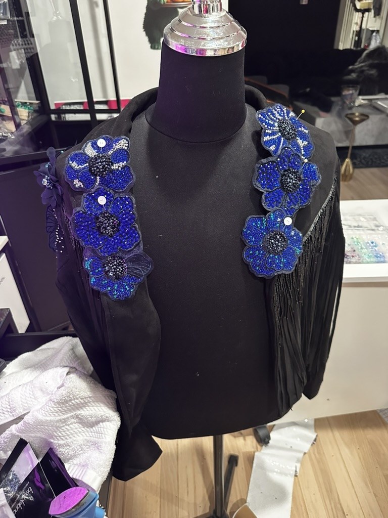 Beaded flowers pinned in place