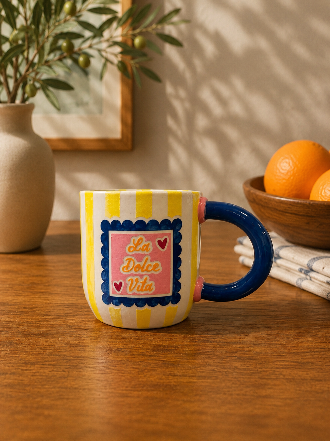 Hand-built mug with hand-painted La Dolce Vita lettering and Italian-inspired details.