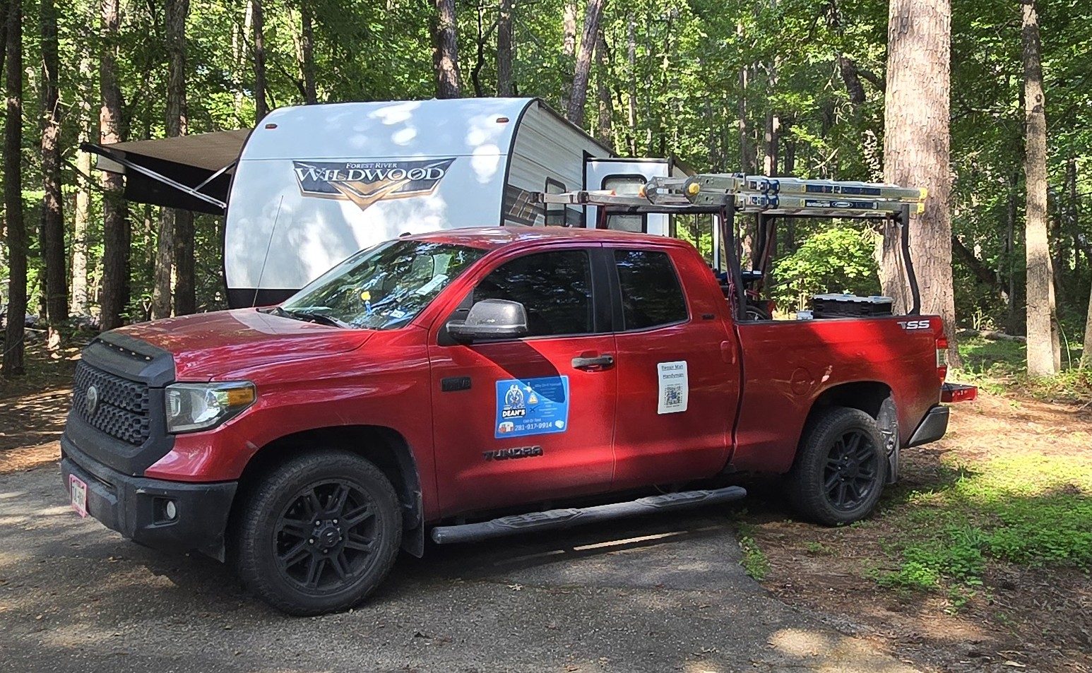 Work truck and RV on site — mobile service across the Ark-La-Tex