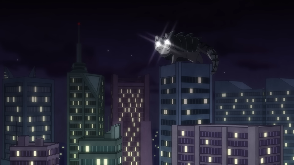 Gamenya stands tall on top of a building.