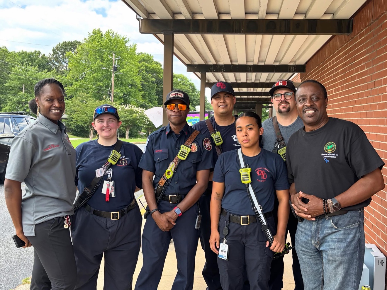 Commissioner Mitchell with Douglas County Fire Department crew members
