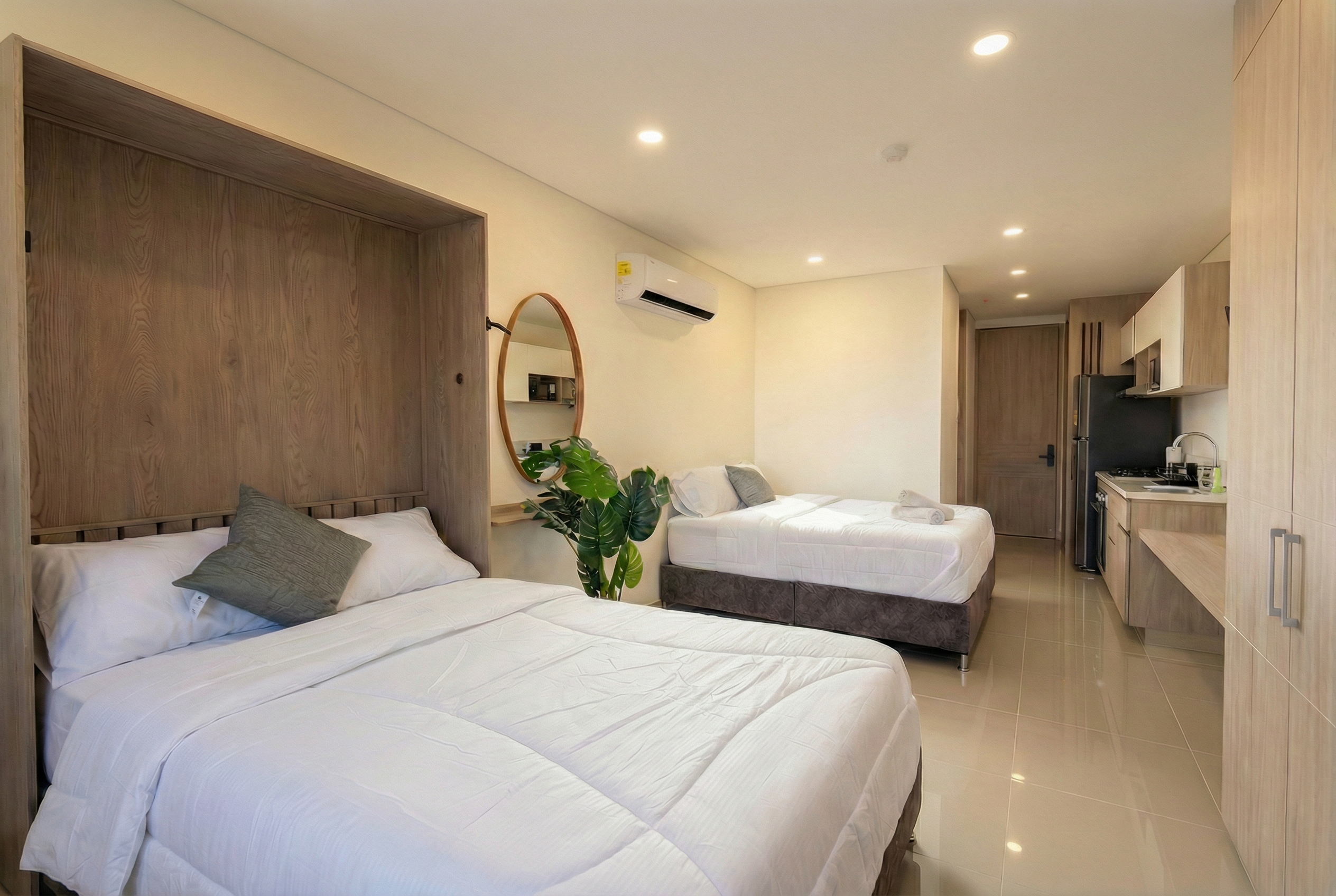 Suite con dos camas y cocina completamente equipada
