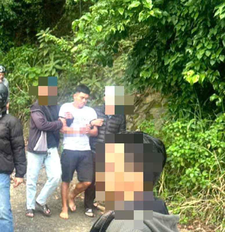 Lực lượng chức năng áp giải nghi phạm