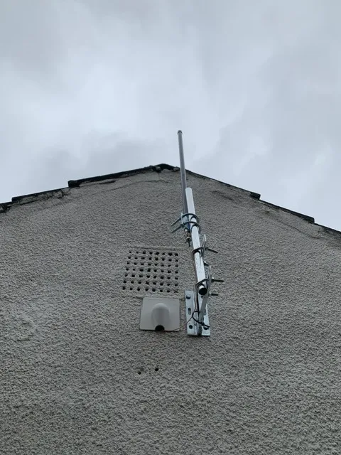 Security camera cabling and Ethernet cables running through a loft space during installation