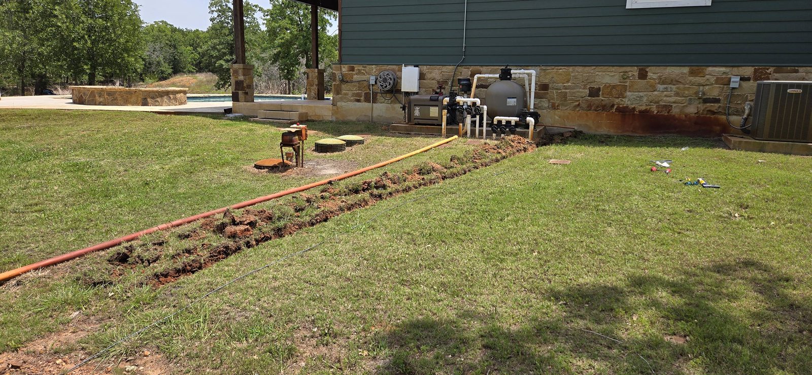 Trenching for an underground cable run