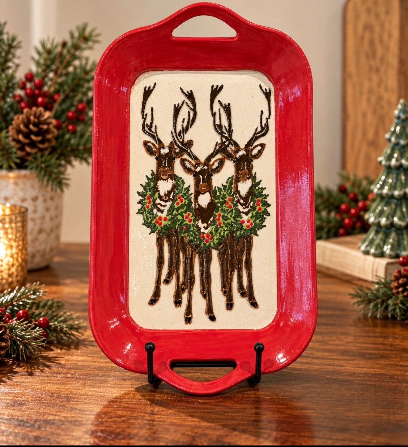 Hand-built tray with a hand-painted reindeer design.