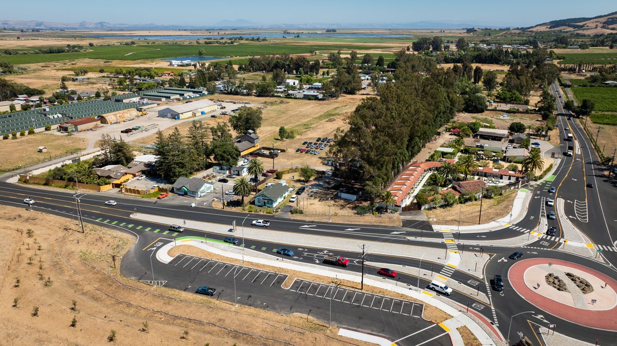 Aerial view — roundabout and commercial corridor