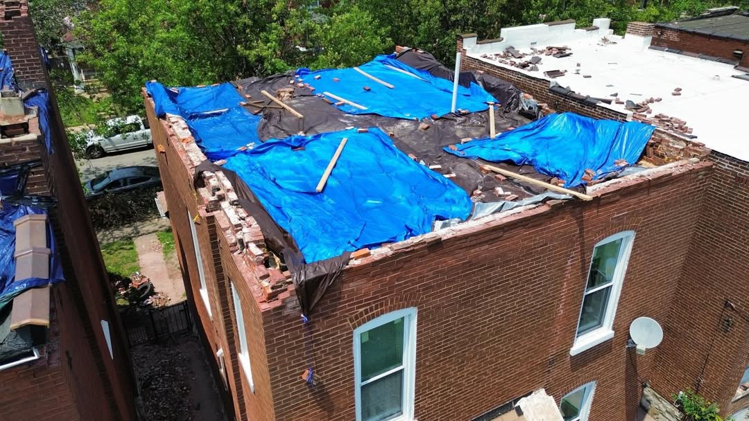 Flat roof covered during repair work