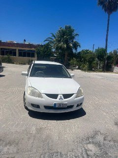 Продам Митсубиси Лансер 2004